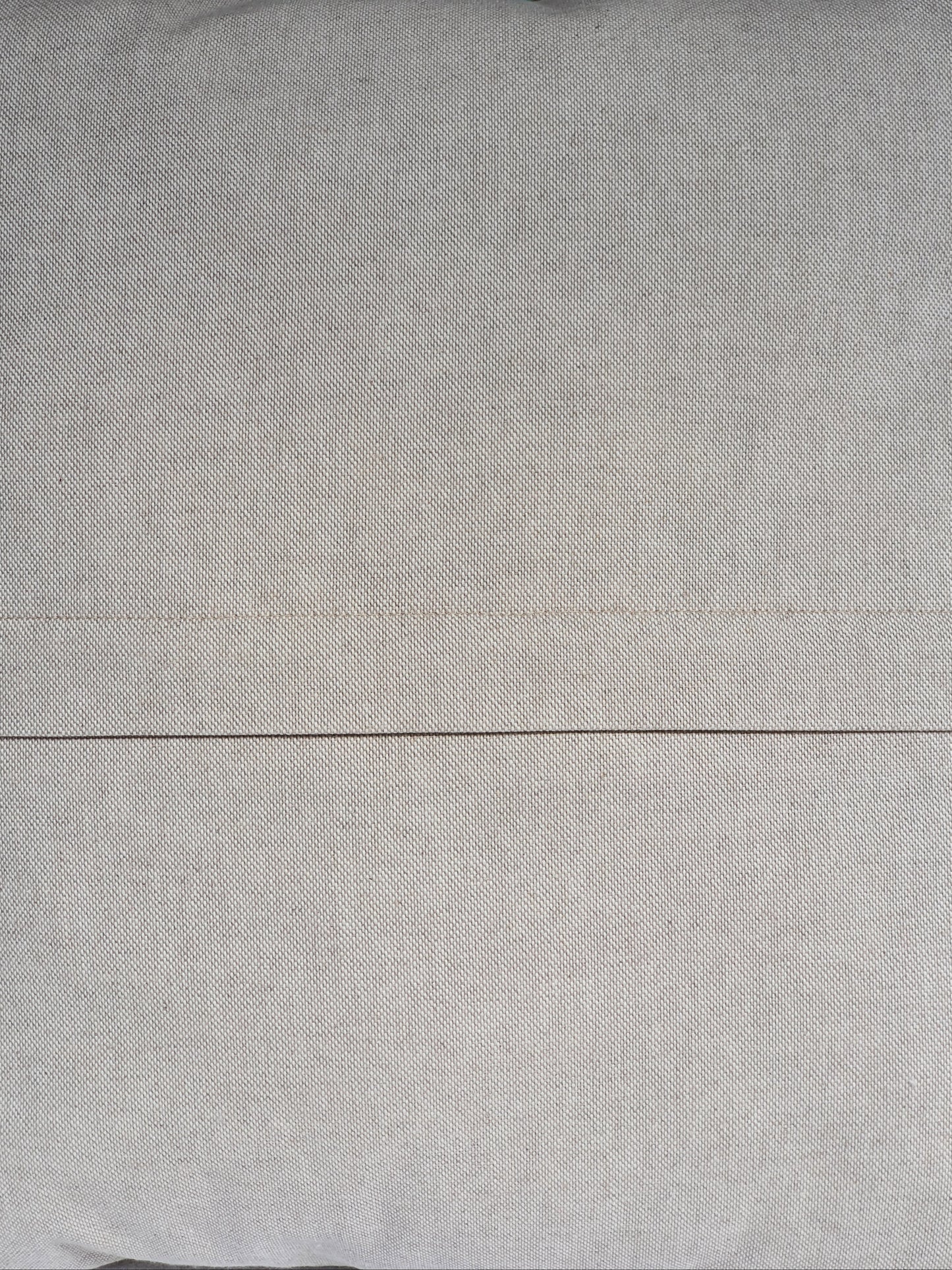 The reverse of the cushion cover which shows the enclosed zip.