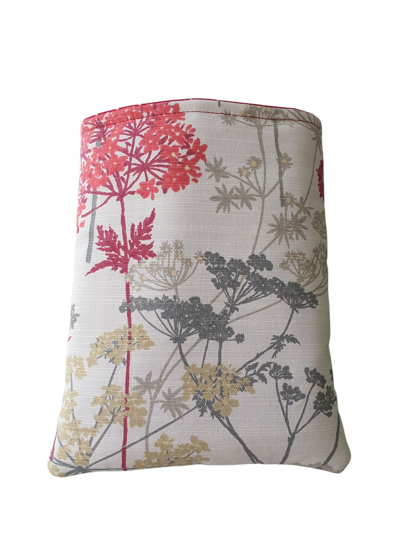 The handmade Book Cover is made with Hedgerow Country Floral Ruby fabric. The Book Cover is approximately 9.5 inches by 7.5 inches and would also offer protection for a Kindle or e-Reader but check the measurement of the device prior to placing an order.