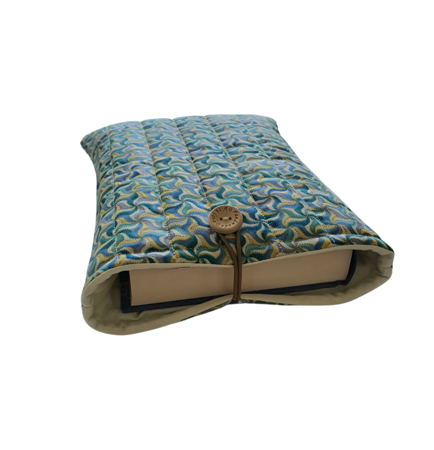 The handmade Book Pouch will also protect medium size hardbacks from wear and tear. The Book Cover is approximately 24cms x 19cms and may also be suitable for a Kindle but check measurements of your device first.