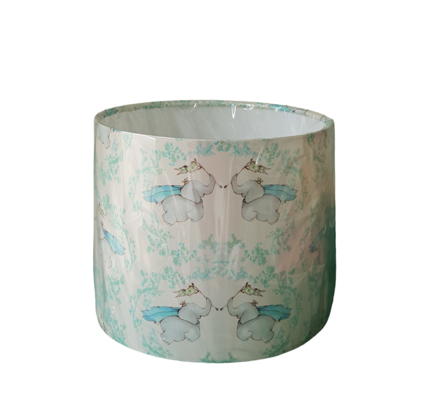 The handmade drum lampshade is wrapped in biodegradable cellophane to protect the shade until it has a new home.