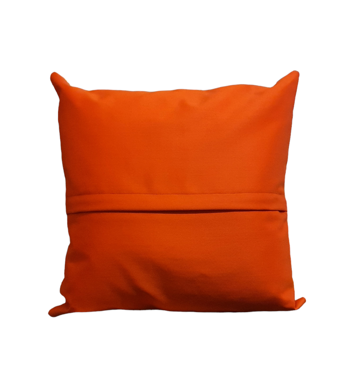 Red fabric on reverse of cushion cover with an enclosed zip