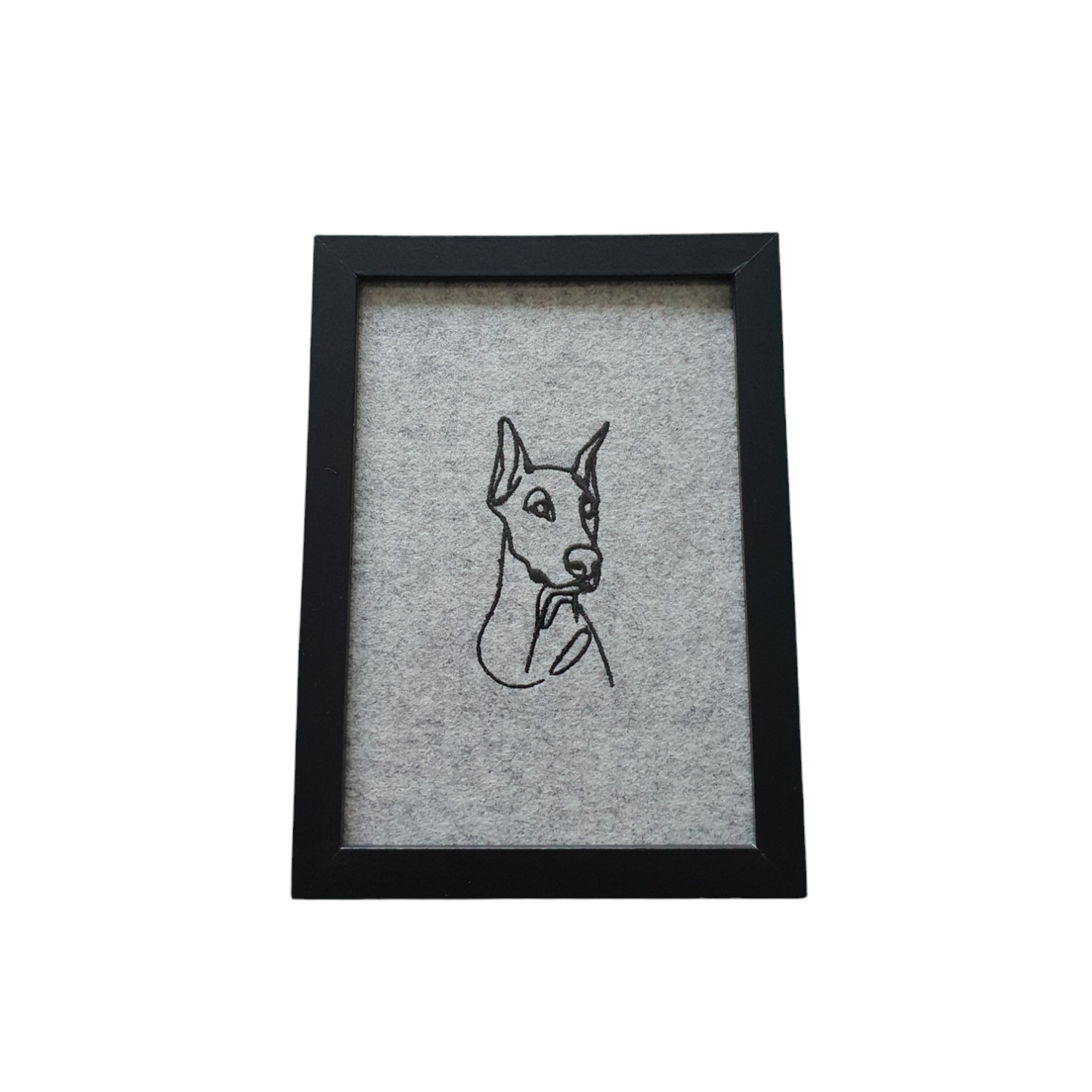 Embroidered Doberman Pinscher on light grey boiled wool mounted in a black frame. Would be a lovely idea as a Dog Lovers Gift.