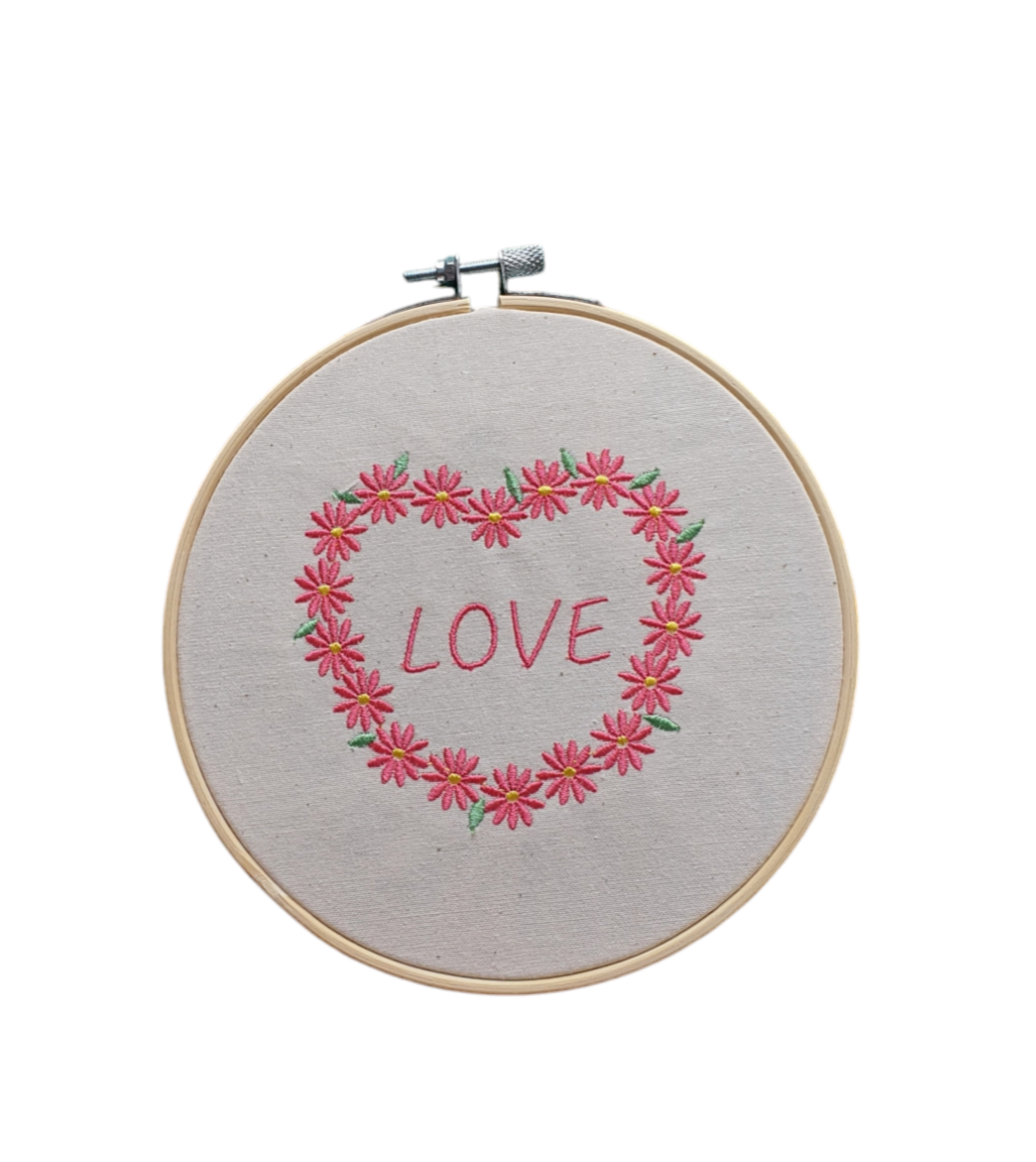 Embroidered bamboo 6 inch hop with a floral heart with the word 'LOVE' in the centre.