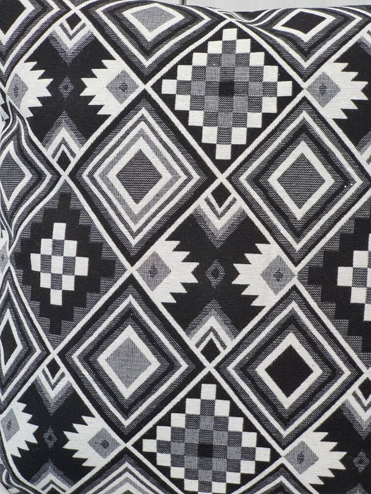 A close up of the monochrome patterned fabric.