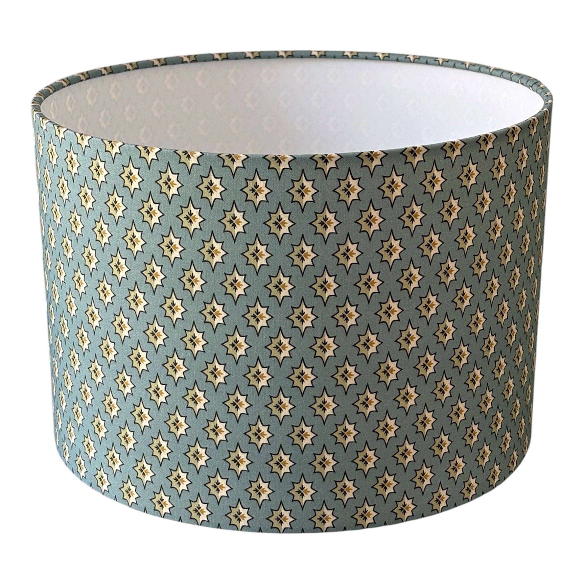 Handmade 30cm drum lampshade made using Selsey fabric in China Blue from the Titley and Marr range of fabrics.