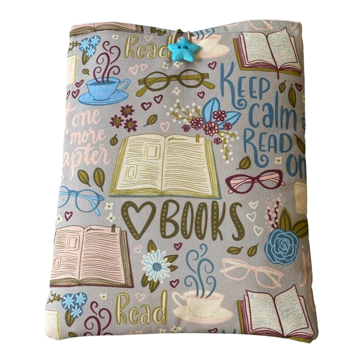 Handmade padded Book Pouch made with book themed fabric and would be an ideal Book Lovers Gift to protect books from wear and tear whilst being carried on the go.