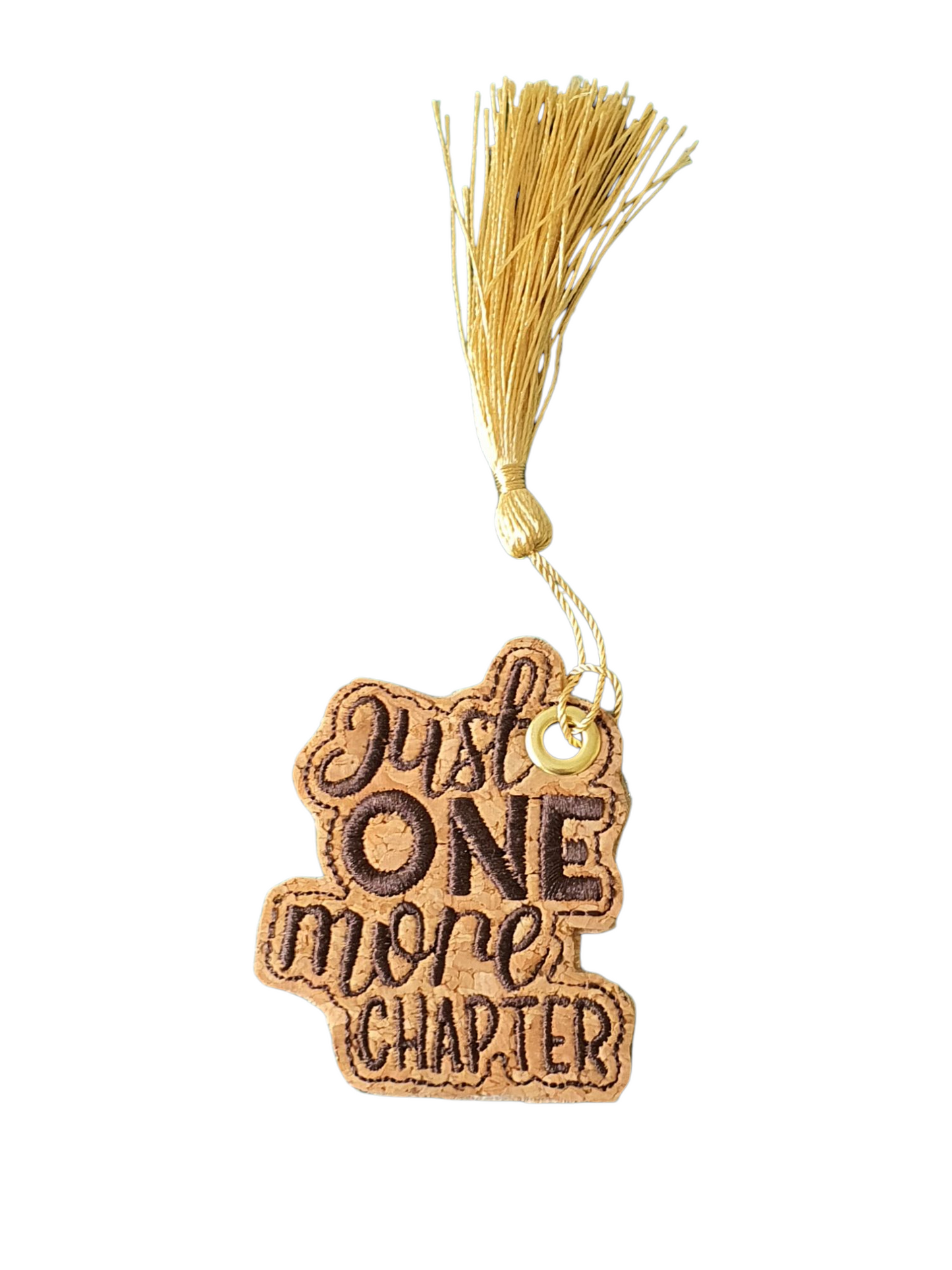 Dark brown embroidered 'Just One More Chapter' bookmark with eyelet and gold coloured tassel.