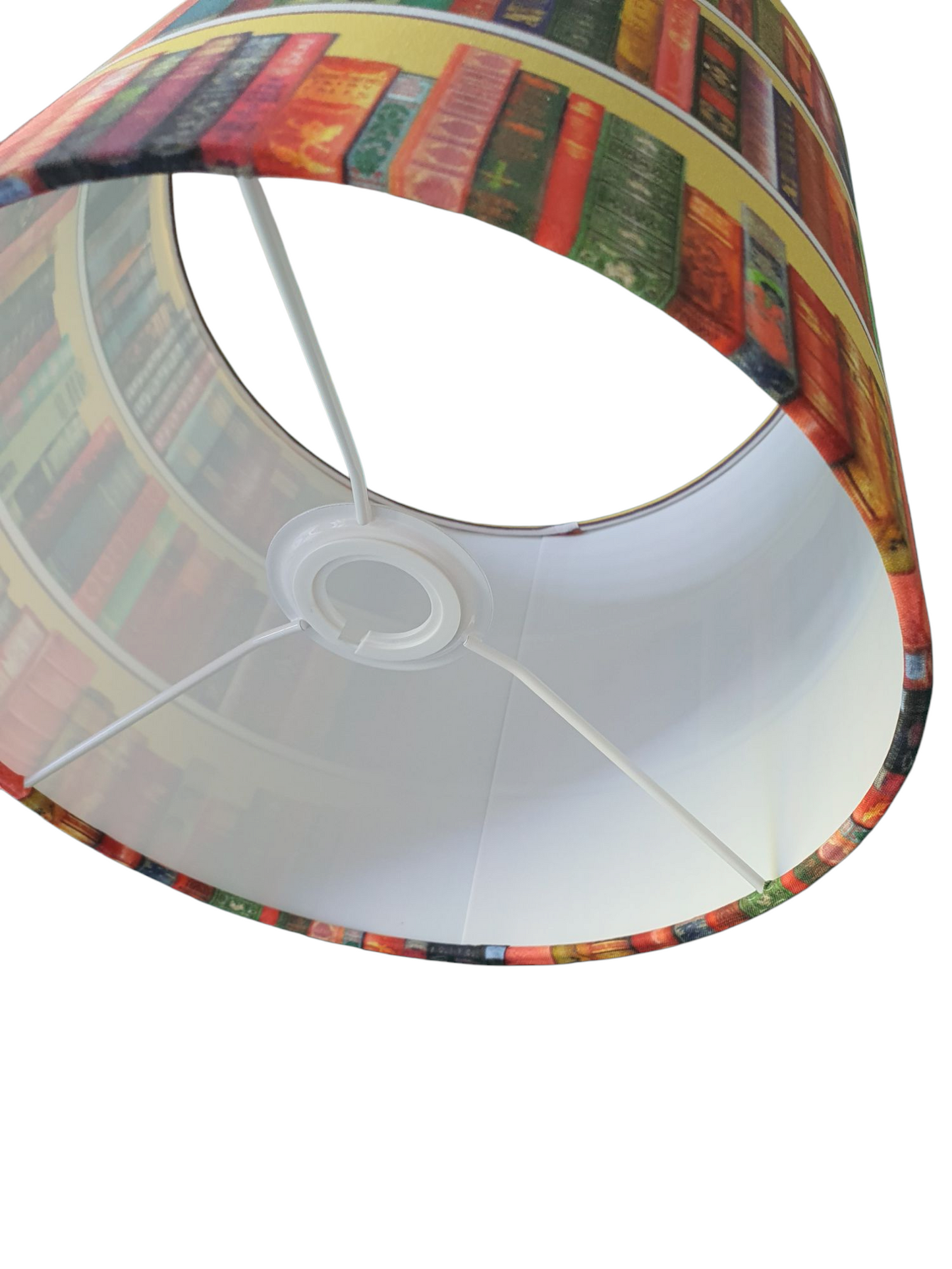 The handmade shade is lined with fire retardant white PVC which meets UK Standards and has passed the Lighting Association Glow Wire Test.