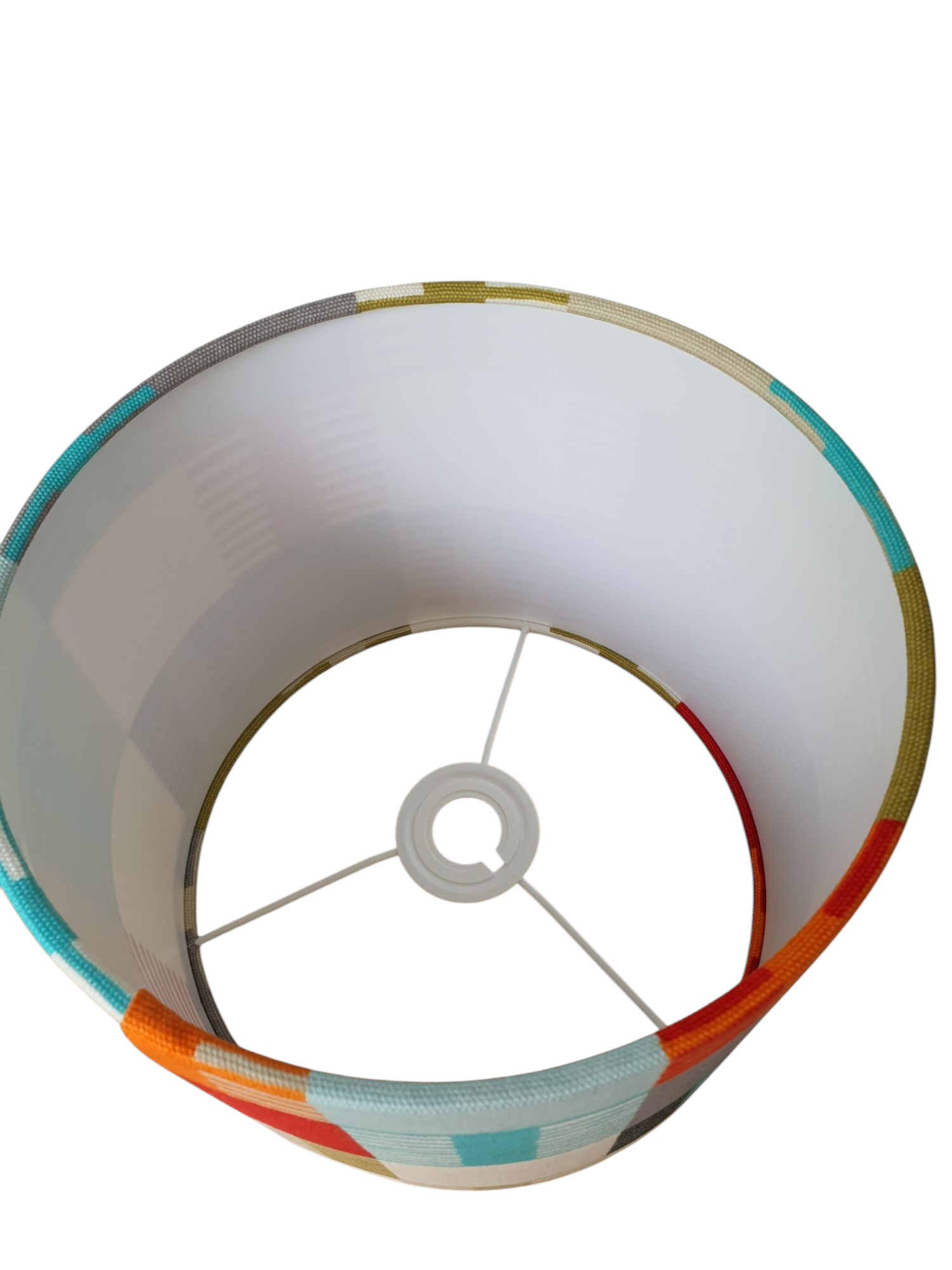 A view of the drum lampshade from the top of the shade looking inside the drum inside towards the rings.
