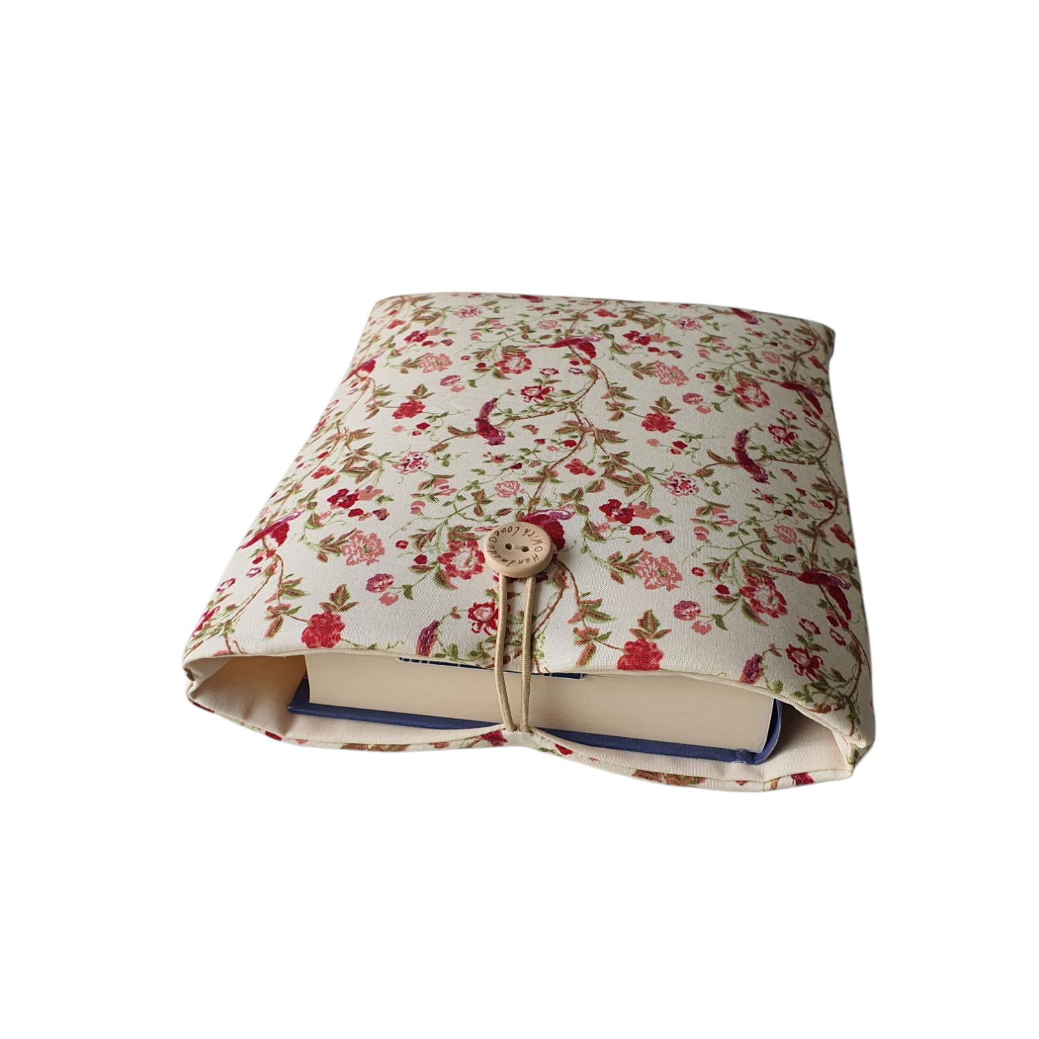 Handmade foam padded Book Pouch made with floral and hummingbird fabric.  The Book Sleeve fastens with an elastic loop and button.