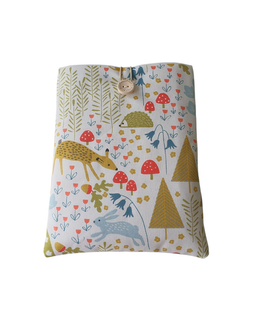 Handmade padded Book Pouch made with forest animals fabric, padded with fusible wadding, lined with complementing neutral fabric and fastens with elastic and a button. 