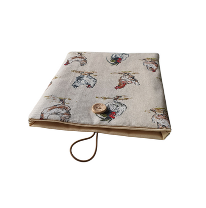 The padded Book Pouch showing the neutral fabric lining the Book Sleeve, together with the button and elastic fastening.