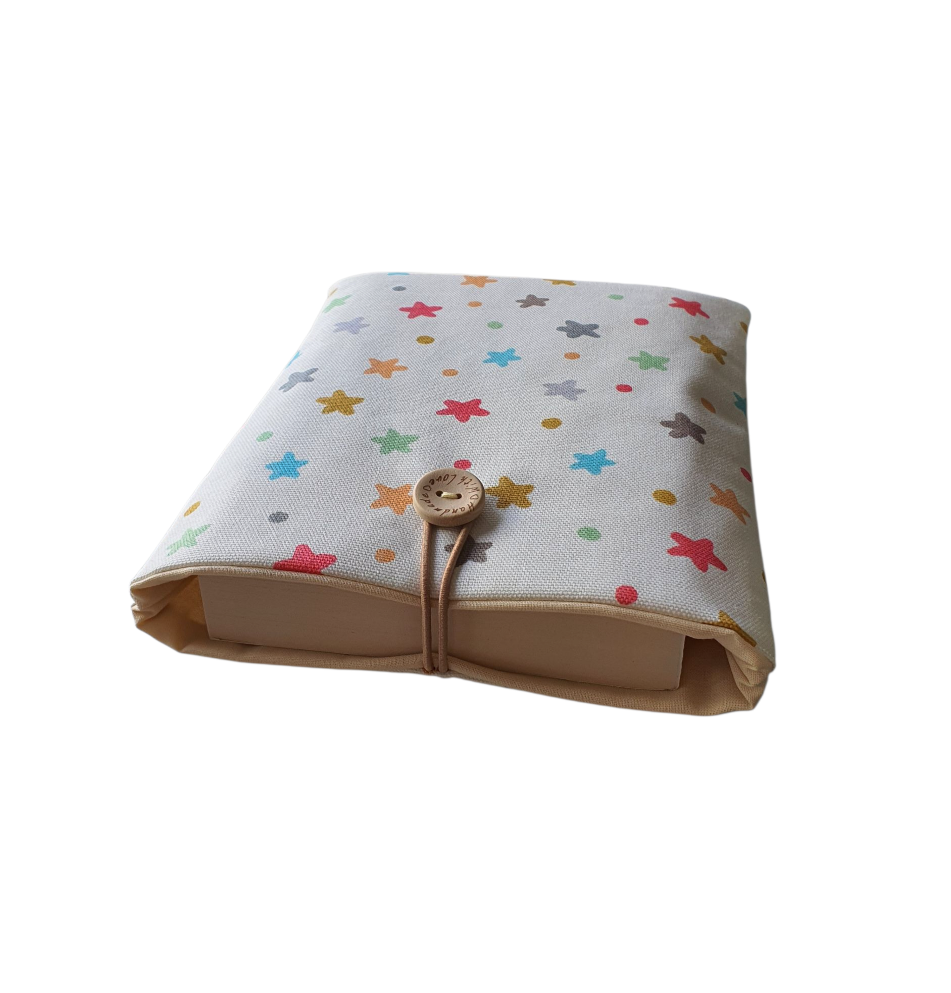 The padded Book Pouch is padded with fusible wadding, lined with complementing fabric and fastens with elastic and a button.  As well as protecting standard paperbacks from wear and tear whilst being carried on the go, the padded Book Pouch will offer protection for a Kindle or e-Reader.  Please check measurements of your device prior to placing an order.