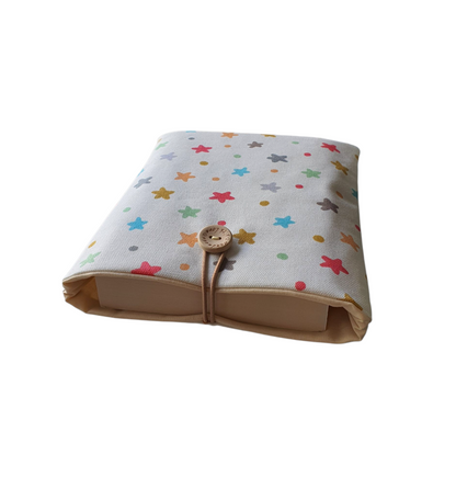 The padded Book Pouch is padded with fusible wadding, lined with complementing fabric and fastens with elastic and a button.  As well as protecting standard paperbacks from wear and tear whilst being carried on the go, the padded Book Pouch will offer protection for a Kindle or e-Reader.  Please check measurements of your device prior to placing an order.