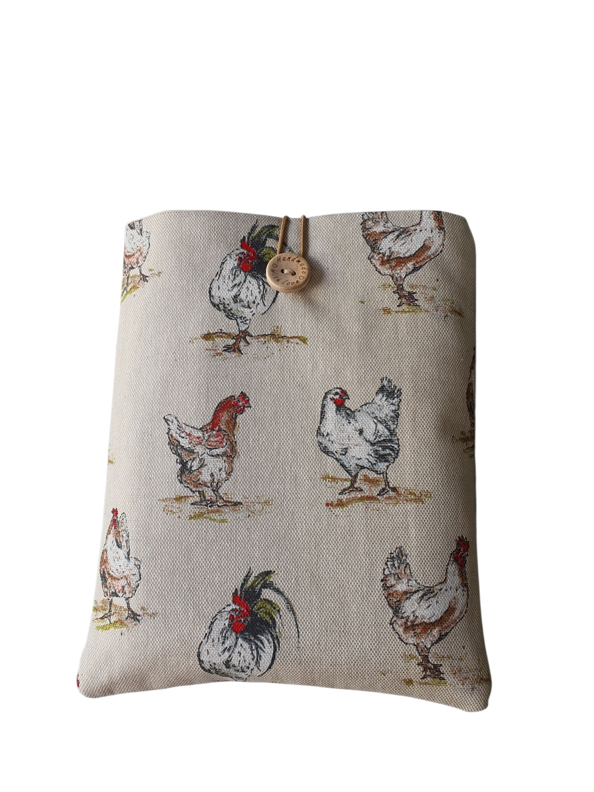 Handmade padded fabric Book Pouch made with Chicken Hens patterned fabric.  The Book Sleeve is padded with fusible wadding, lined with complementing neutral fabric and fastens with elastic and a button.  The handmade Book Cover is approximately 20cms by 17 cms.