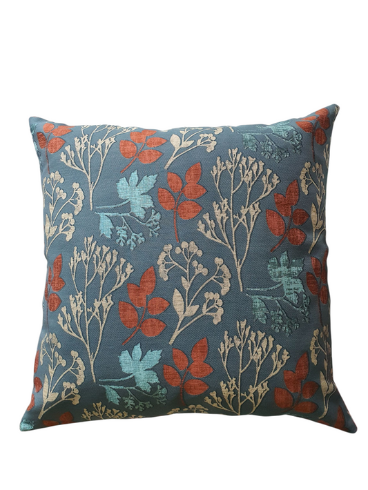 Handmade zipped cushion cover made with Prestigious Textiles Elliott Teal Peacock fabric.  The cushion cover is complemented by neutral fabric on the reverse and fastens with an enclosed ip.