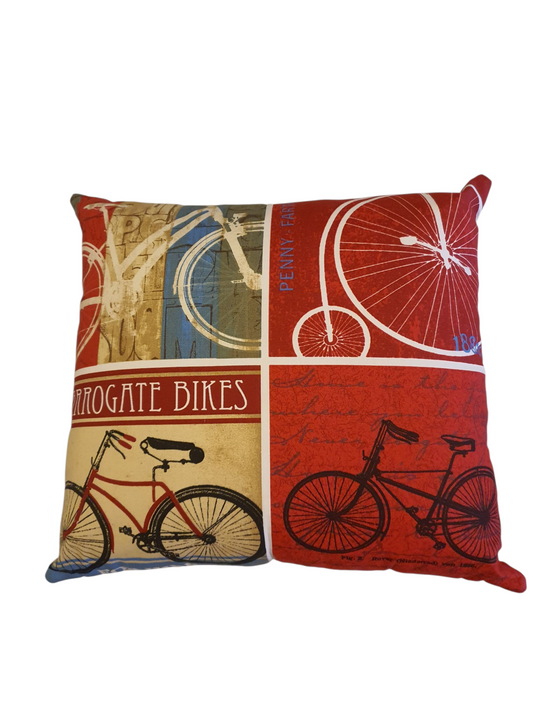 Handmade zipped cushion made with Ashley Wilde Vintage Red Cyclist fabric.  The cushion is approximately 17 inches by 15.5 inches and is supplied with the cushion insert.