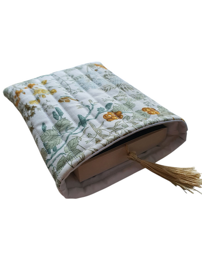 The padded Book Cover is an ideal Book Lovers Gift to protect books from wear and tear whilst being carried on the go.  Please note the book and bookmark are not included and are for illustrative purposes only.  The Bookmarks are available on our website.