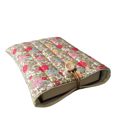 The padded Book Pouch will protect paperbacks as well as medium hardbacks.  Please note the book is not included and is for illustrative purposes only.