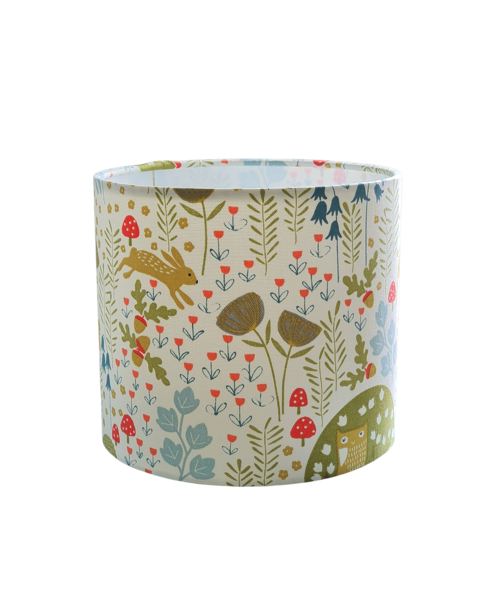 The handmade 20cms drum lampshade is lined with fire retardant white PVC and meets UK Standards and has passed the Lighting Association Glow Wire Test.