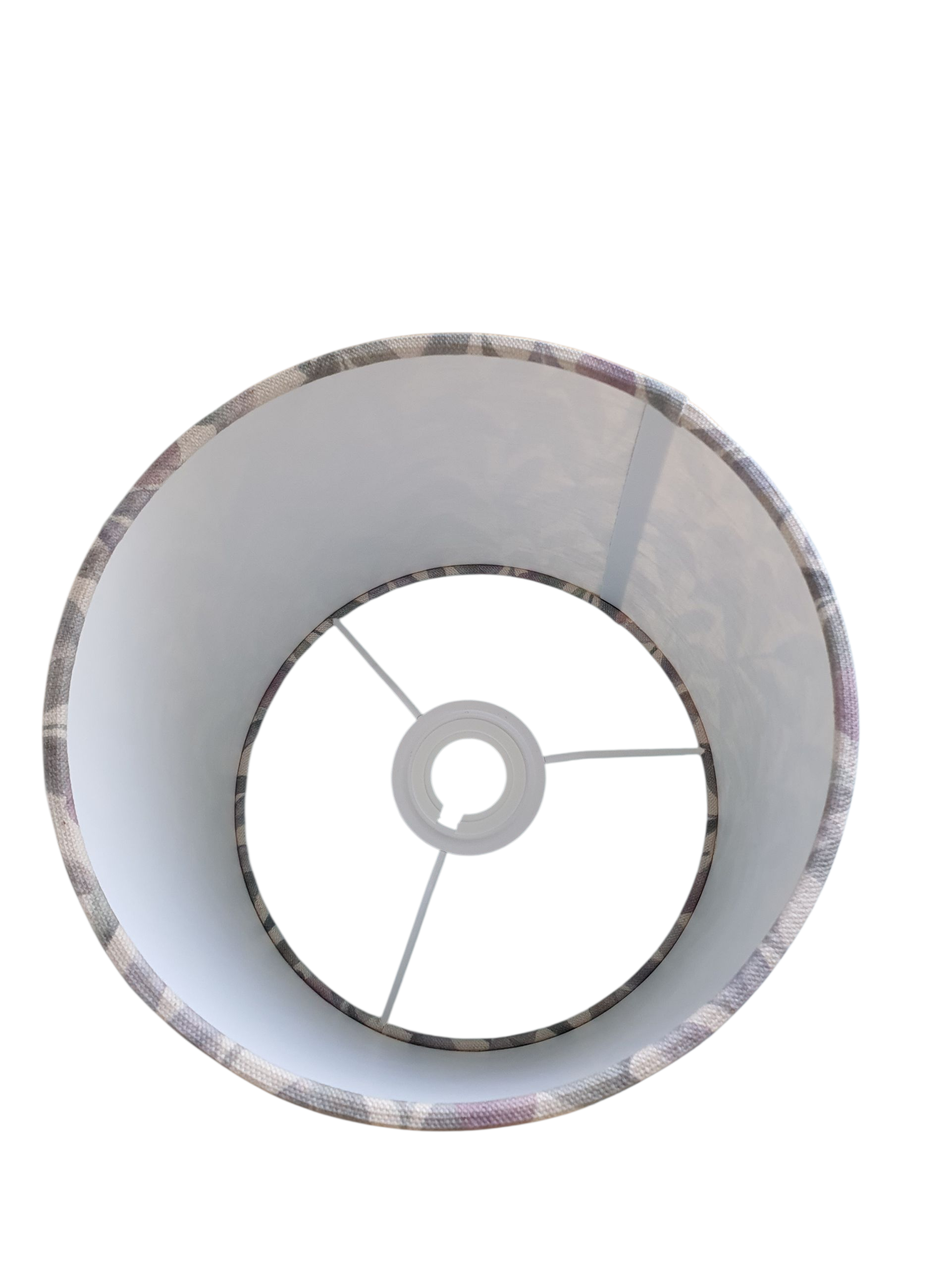 A view of the handmade drum lampshade looking down from the top of the shade to the lampshade fitting.