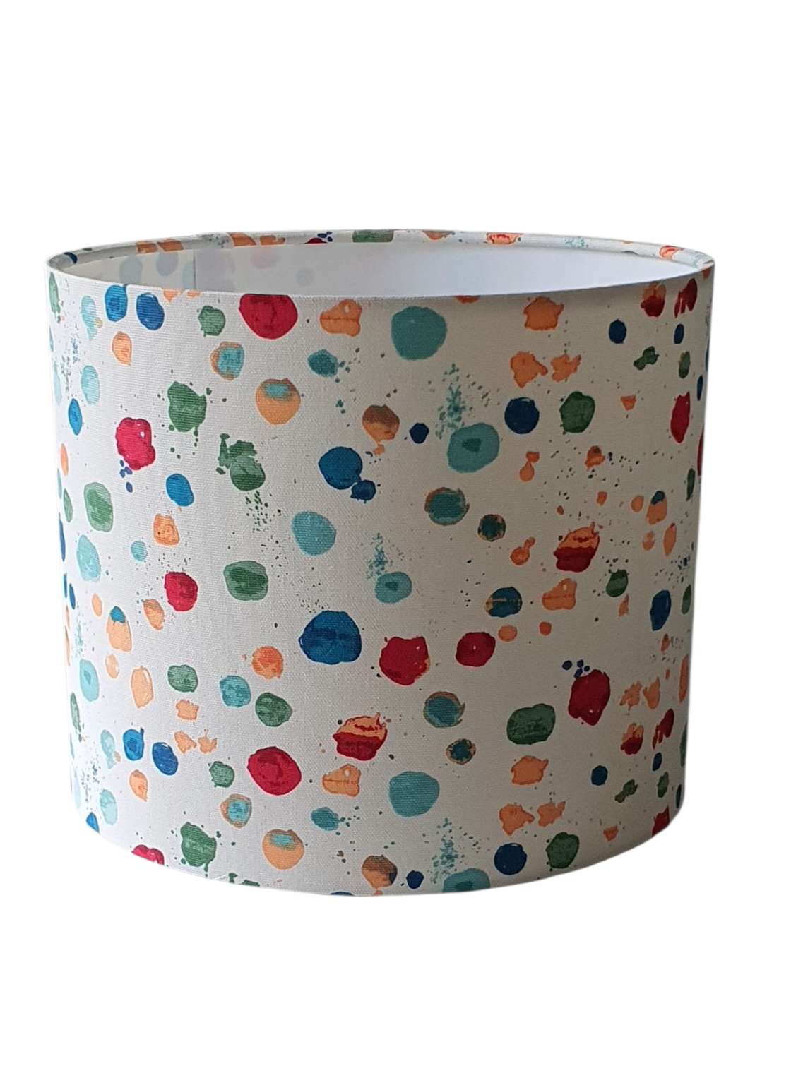 The handmade drum lampshade is 25cms in diameter and 21cms in height.