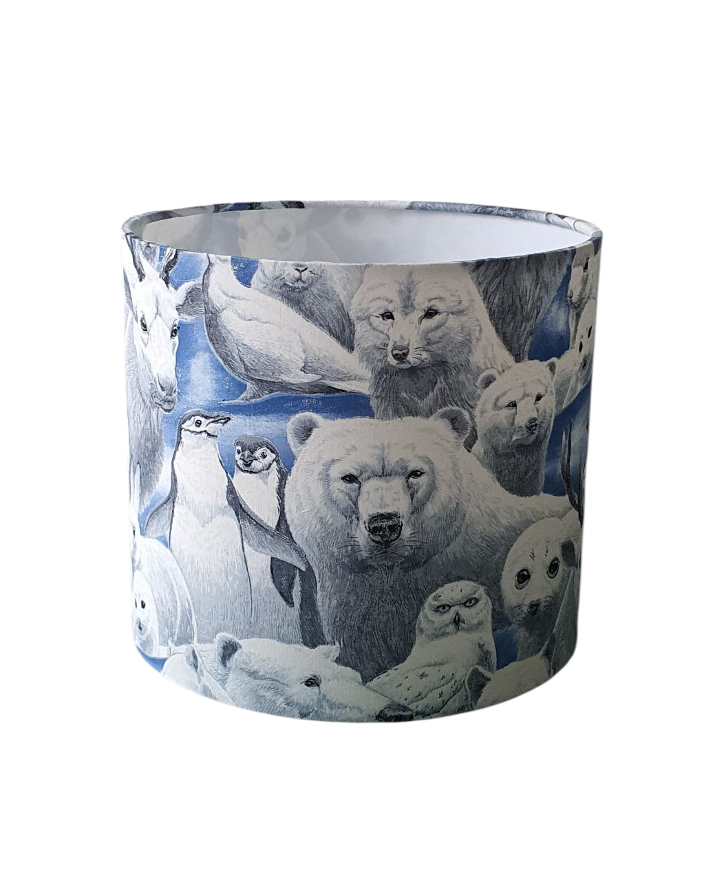 Handmade 20cm drum lampshade made with winter animal fabric which includes Polar Bears, Penguins, Seals and Stags