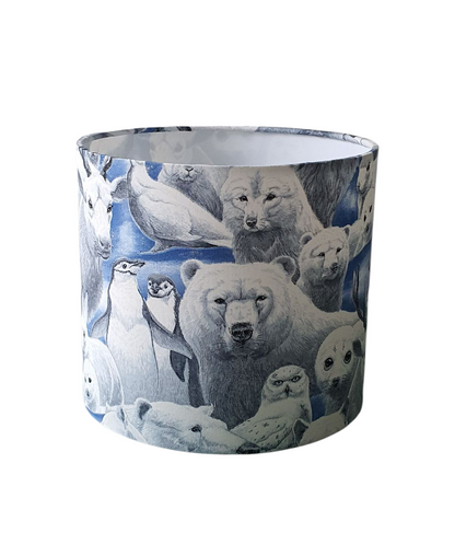 Handmade 20cm drum lampshade made with winter animal fabric which includes Polar Bears, Penguins, Seals and Stags