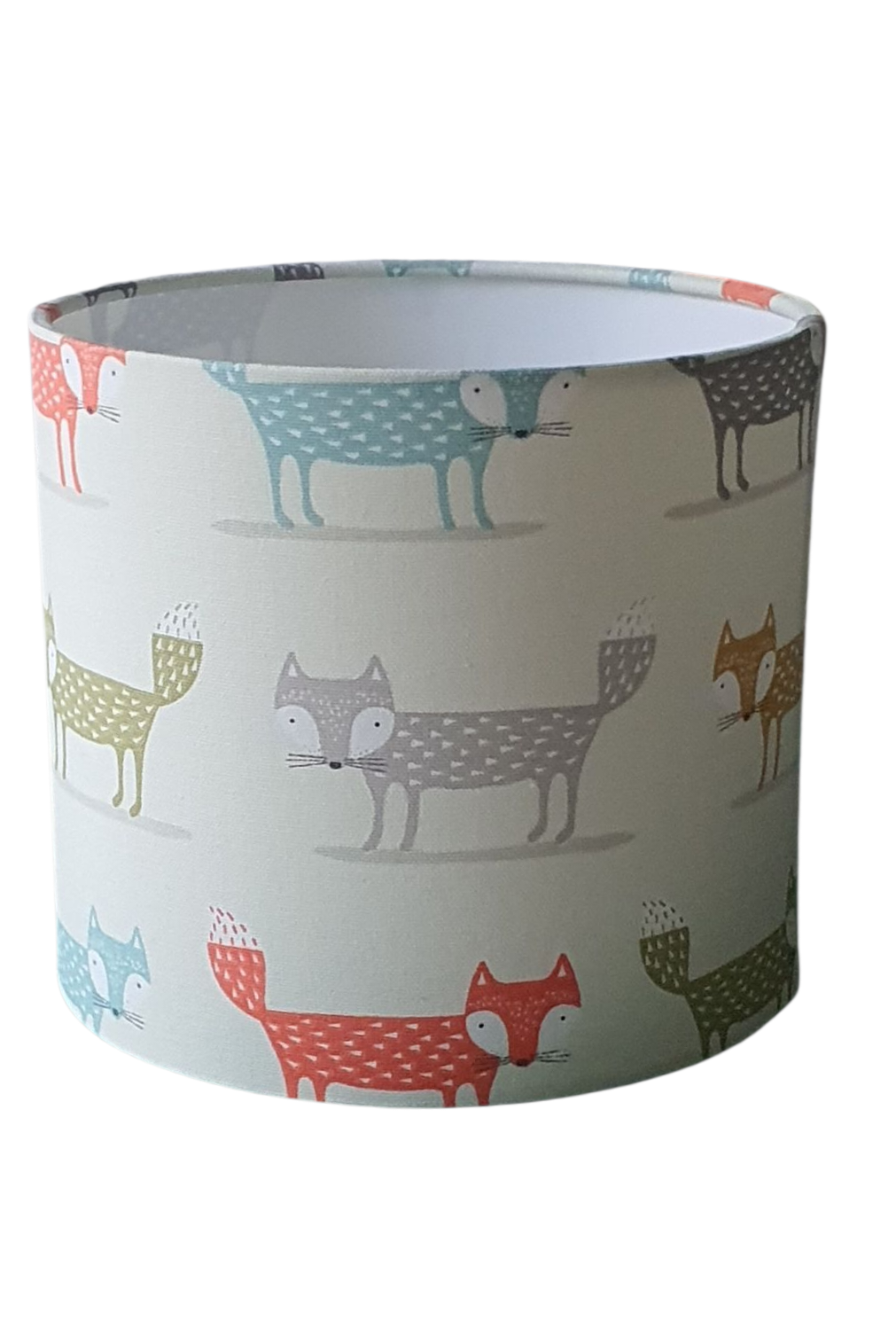 Handmade 20cm drum lampshade made with cute foxes pattern fabric in pastel colours on a neutral background.