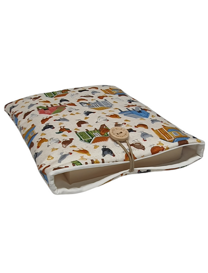 Handmade padded Book Pouch made with Makower Village Life fabric.  An ideal Book Lovers Gift.  Please note the book is not included and is for illustrative purposes only.