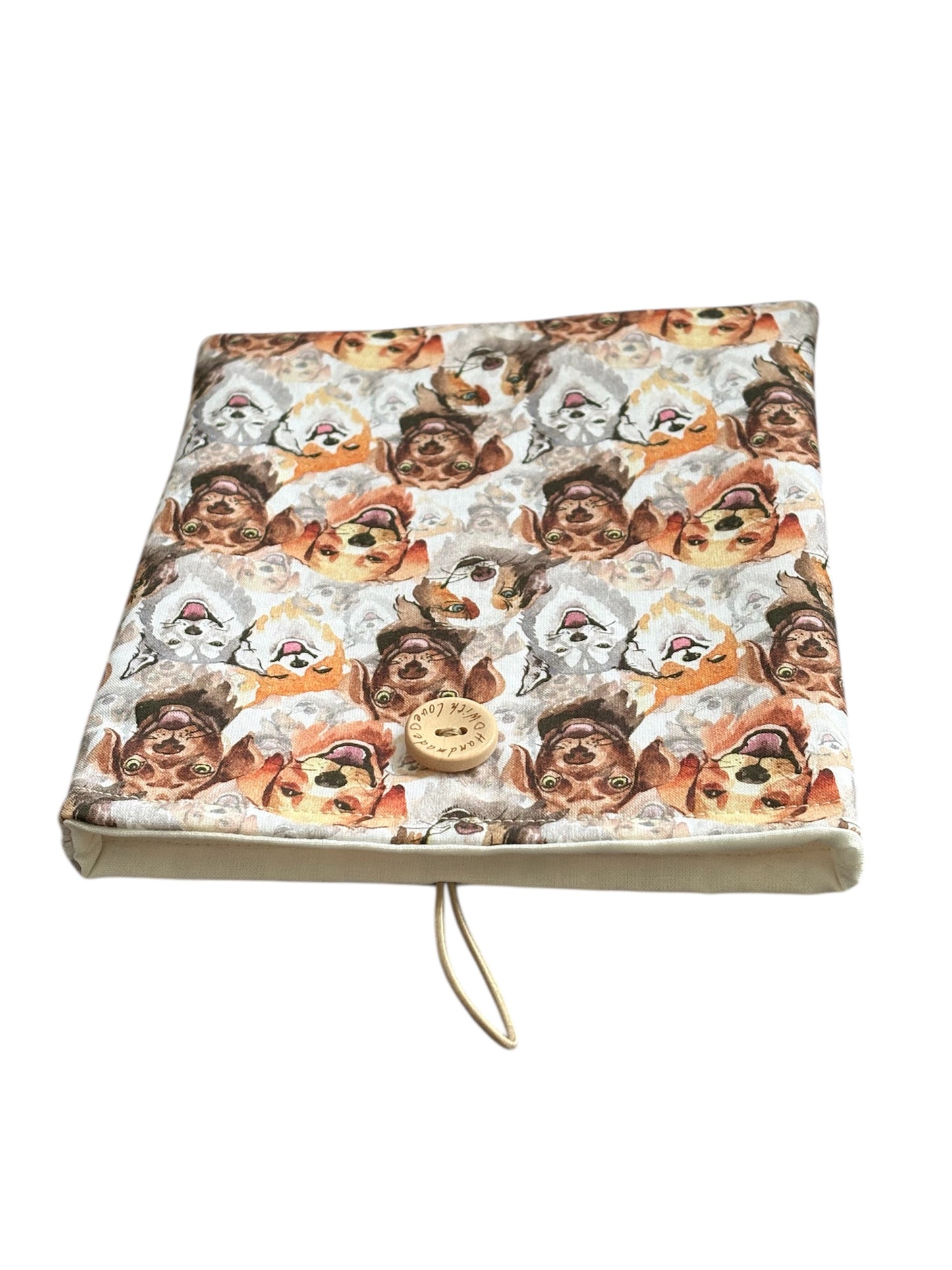The dog patterned fabric padded Kindle/Book Pouch is approximately 18cms x 16cms (7 inches x 625 inches). Please check the measurements of your device or book prior to placing an order.