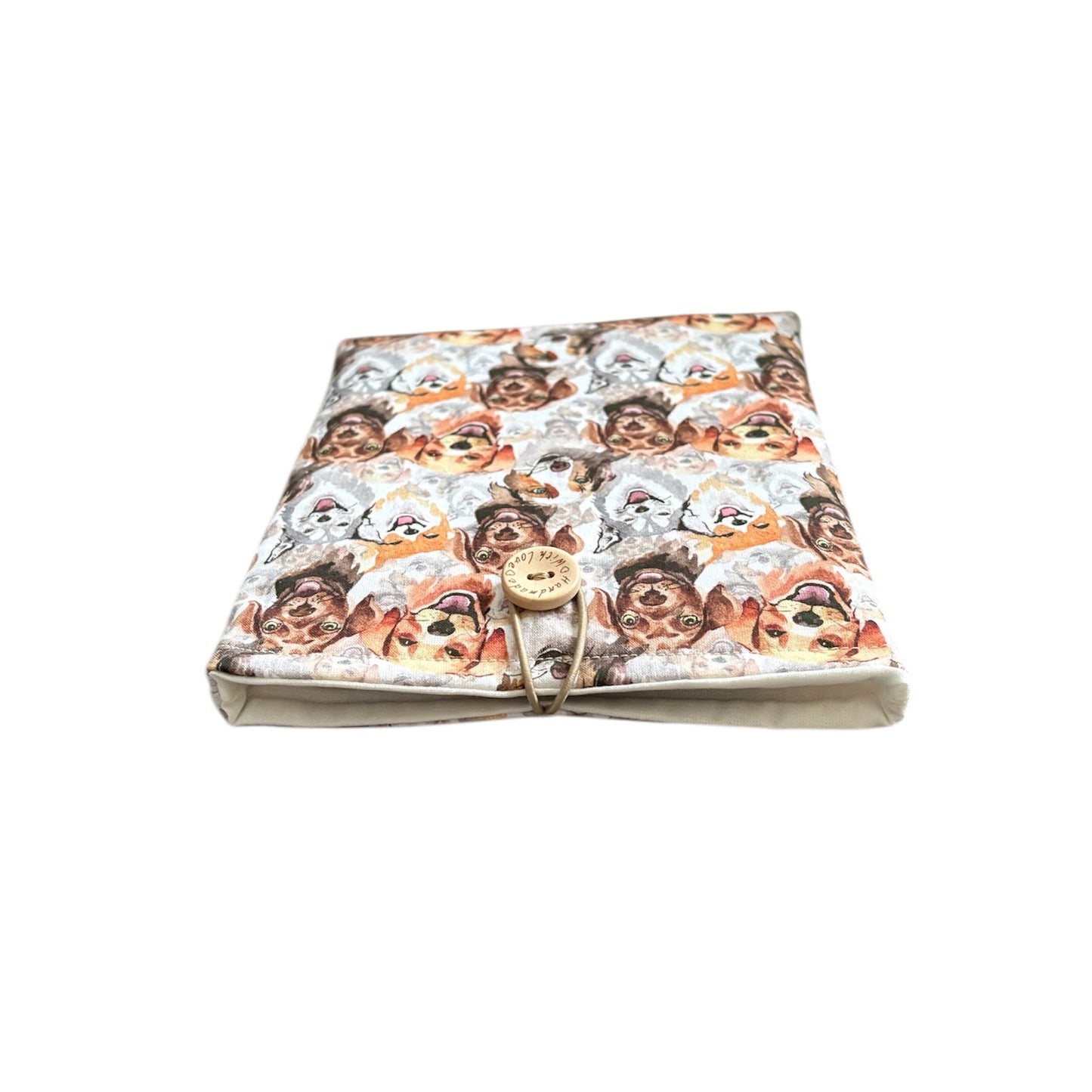 The padded Kindle/Book Pouch has elastic and button closure.