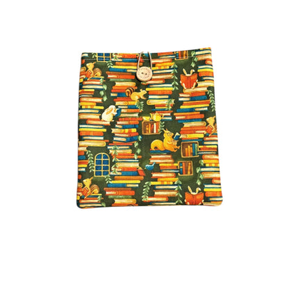 Handmade padded Kindle/Book Pouch made with Forest Fables Stacked Books fabric.