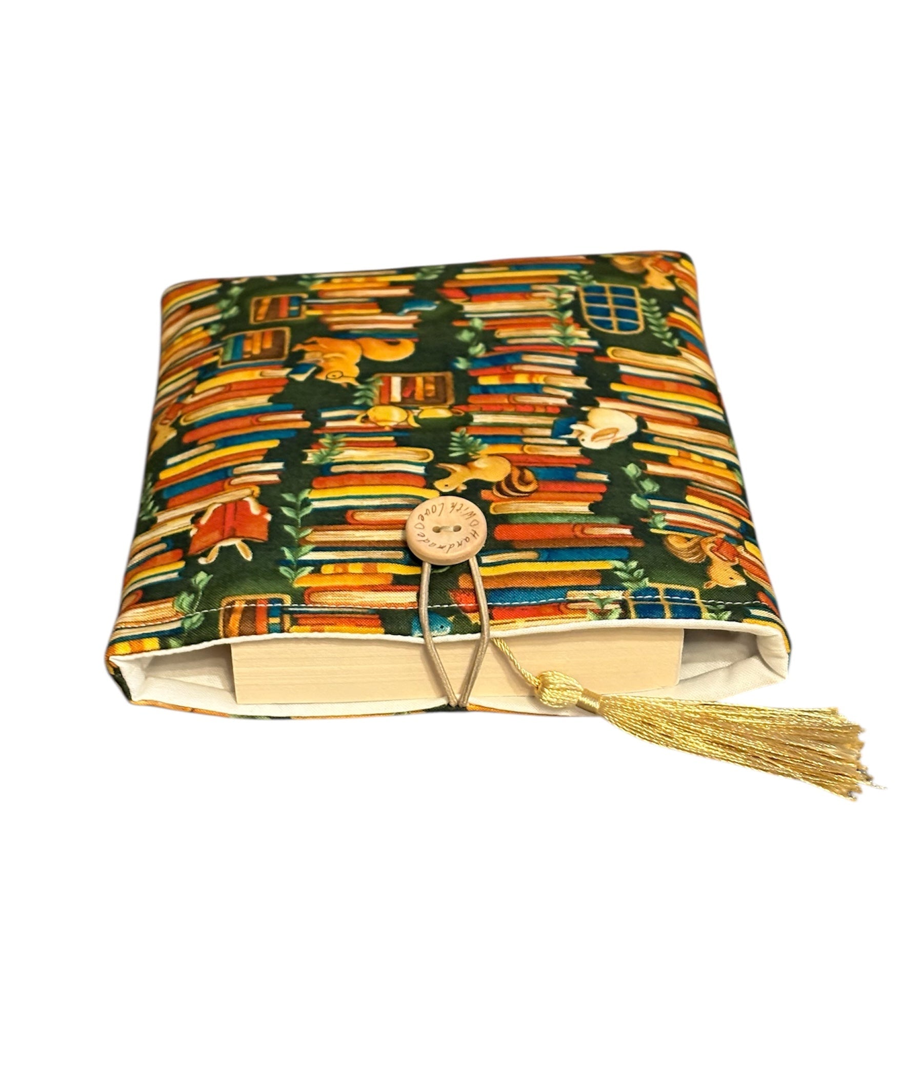 The padded Book Pouch will protect small paperbacks from wear and tear whilst being carried on the go.  Please note the book and bookmark in the photo are not included and are for illustrative purposes only.