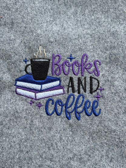 A close up of the embroidered pattern on the front of the Book Pouch.