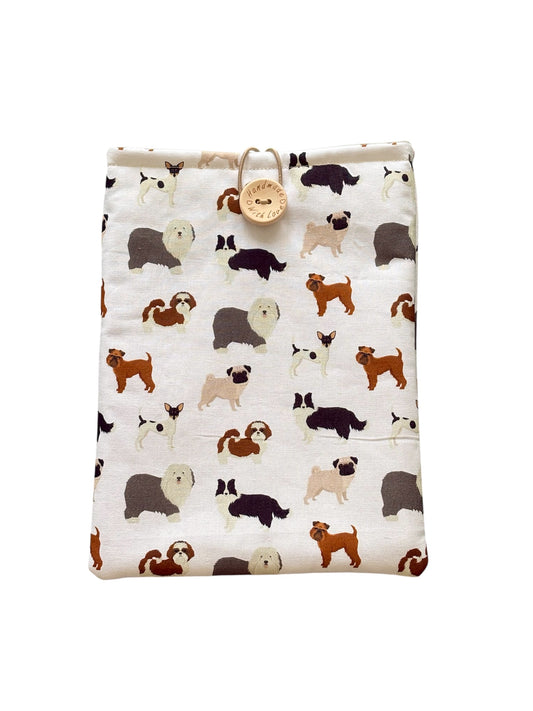 Handmade padded Book Pouch made with dog patterned fabric.  The padded Book Pouch would be an ideal Book Lovers Gift to protect precious books from wear and tear whilst being carried on the go.