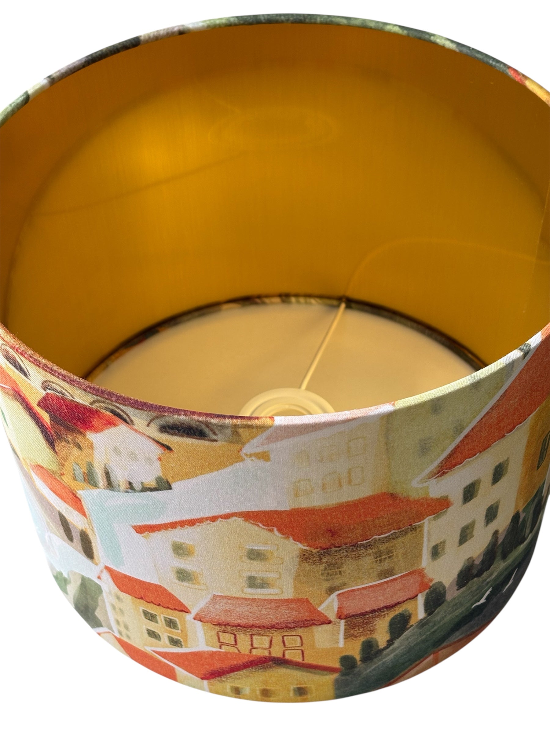 A view of the brushed gold fire retardant PVC lining the drum lampshade.  The lining meets UK Standards and has passed the Lighting Association Glow Wire Test.