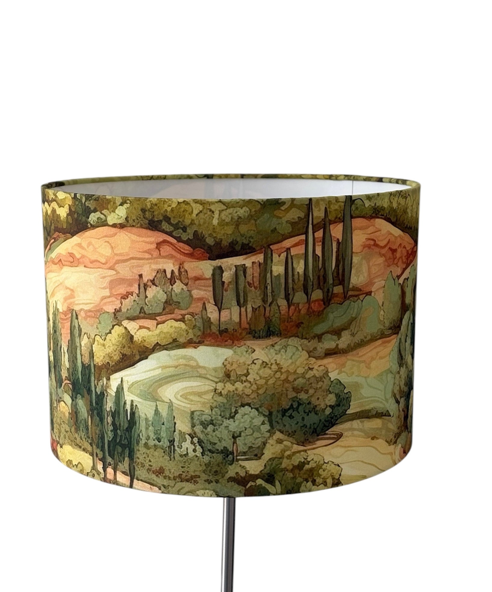 The handmade shade is 30cms diameter and 21cms in height.  The shade is for a lamp base only and is not suitable for a ceiling fitting due to the direction of the pattern.  The rich colours of the landscape will add to any style of home decor for a wow factor.