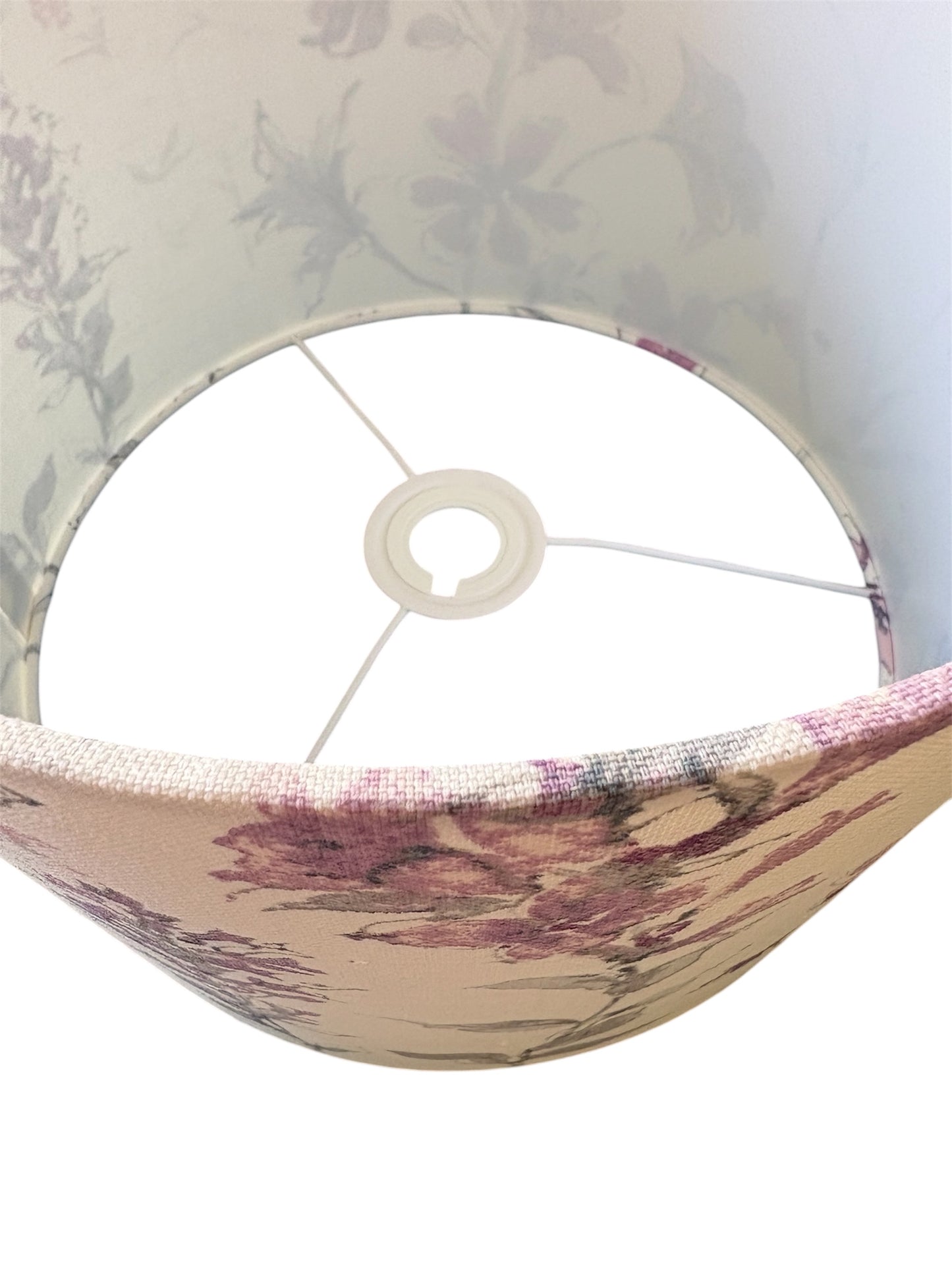 A close up of the lampshade from the top of the shade.  