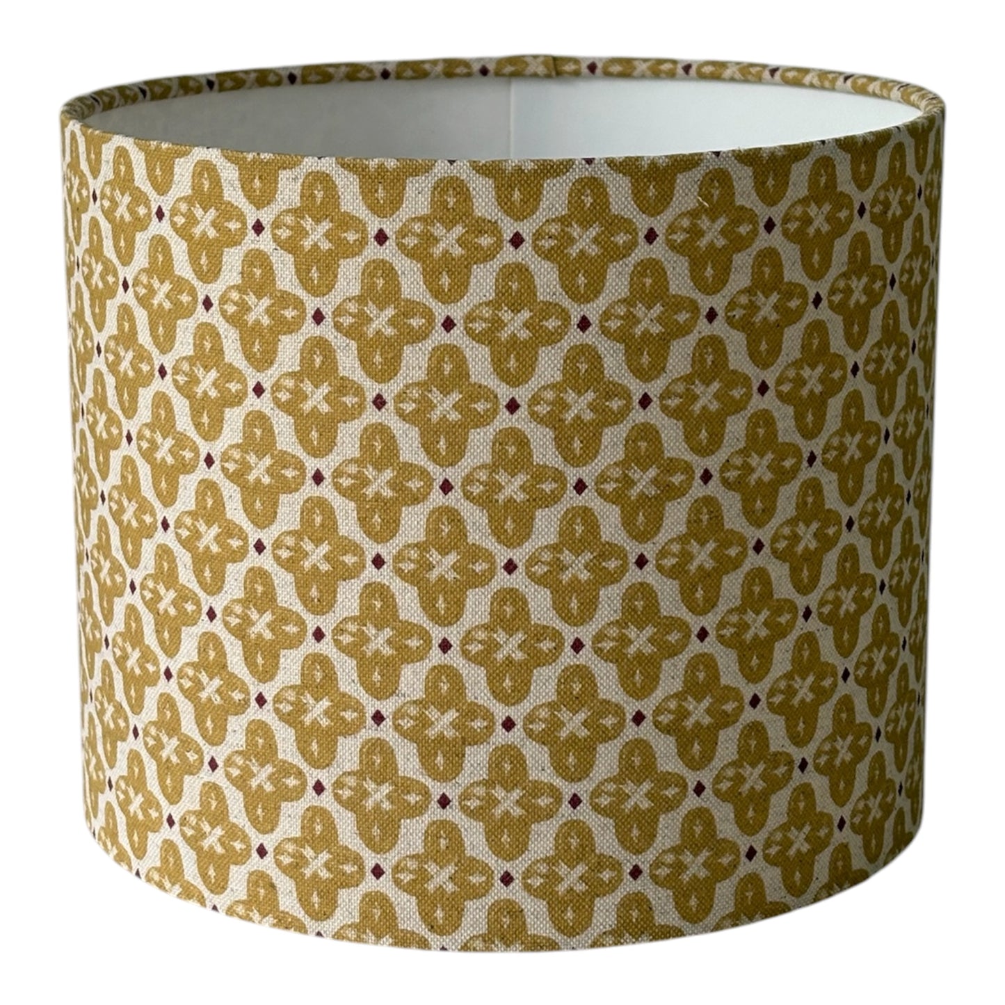 Handmade 25cm lampshade made with Prestigious Textiles Billy Honey fabric.  The geometric style pattern would suit any style of home decor, including modern or traditional.  