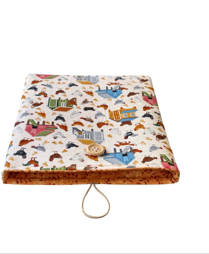 The Book Cover is complemented with orange leaf patterned fabric.  The Book Pouch may also offer protection for a Kindle e-Reader to prevent being marked whilst being carried in a bag, however, please check the measurement of the device prior to placing an order