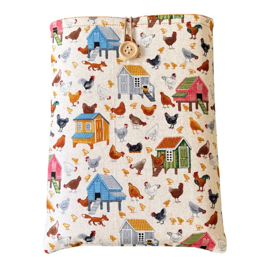 Handmade padded Book Pouch made with colourful Village Life fabric.  The handmade Book Cover is approximately 23cms x 18cms and will be an ideal Book Lovers Gift or for you if you are a bookworm.