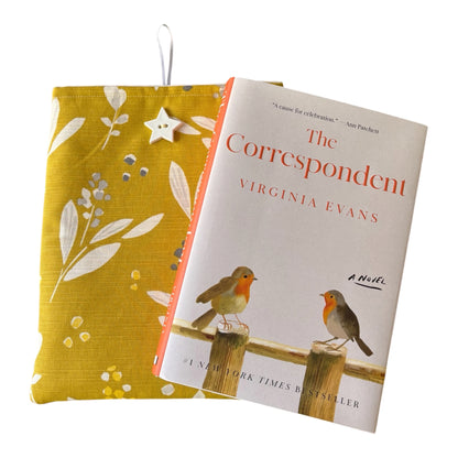 The handmade Book Pouch is an ideal Book Lovers Gift to protect books from wear and tear whilst being carried on the go.  Please note the book in the photo is not included and is for illustrative purposes only.