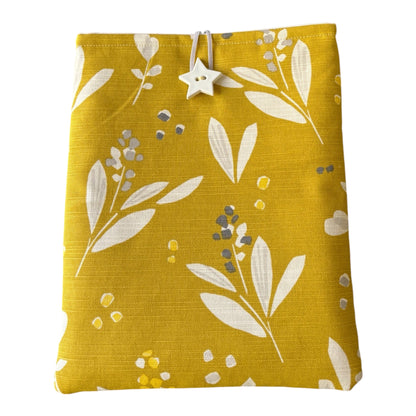 The handmade padded Book Pouch is approximately 19cms x 25cms and may also offer protection for a Kindle/Tablet but check the measurement of the device prior to placing an order.