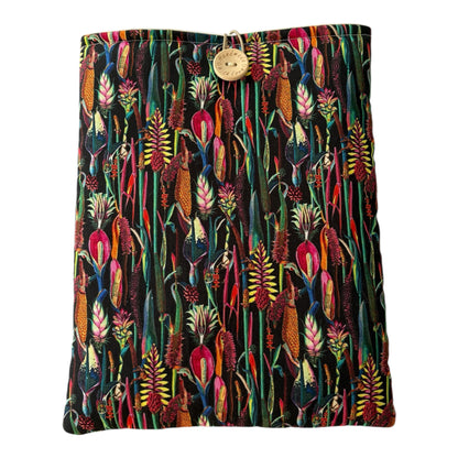 Handmade padded Pouch which would protect books, Kindle or an  iPad whilst being carried on the go.  The padded Book Pouch is approximately 27cms x 21.5cms but check the measurement of the device prior to placing an order. 