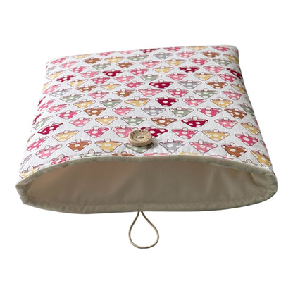 The neutral fabric which lines the padded Book, Kindle, iPad Pouch is shown in this photo.