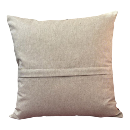 The rear of the cushion cover which has an enclosed zip as indicated in the photo.