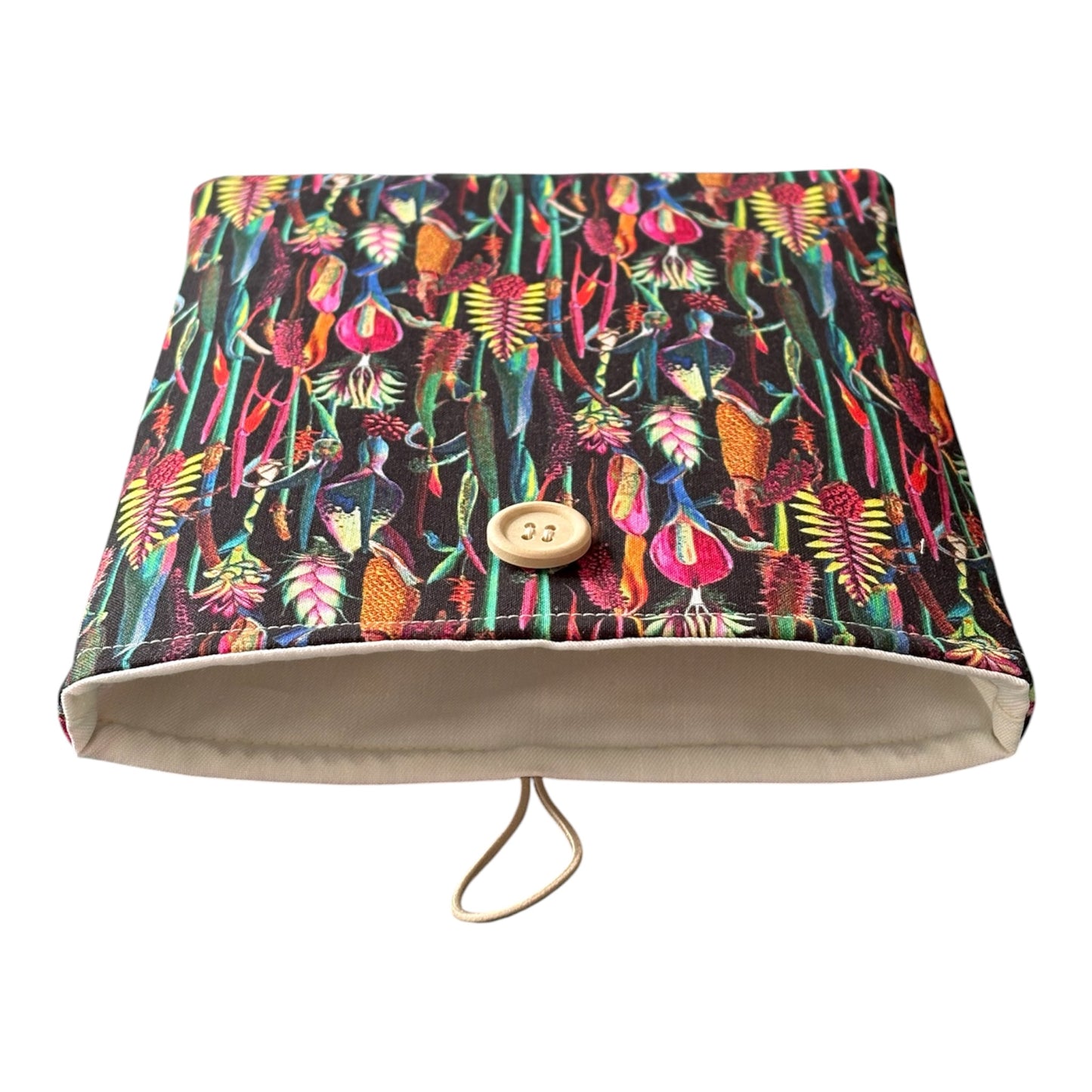 The patterned botanical fabric is complemented with neutral fabric lining as shown in the photo.