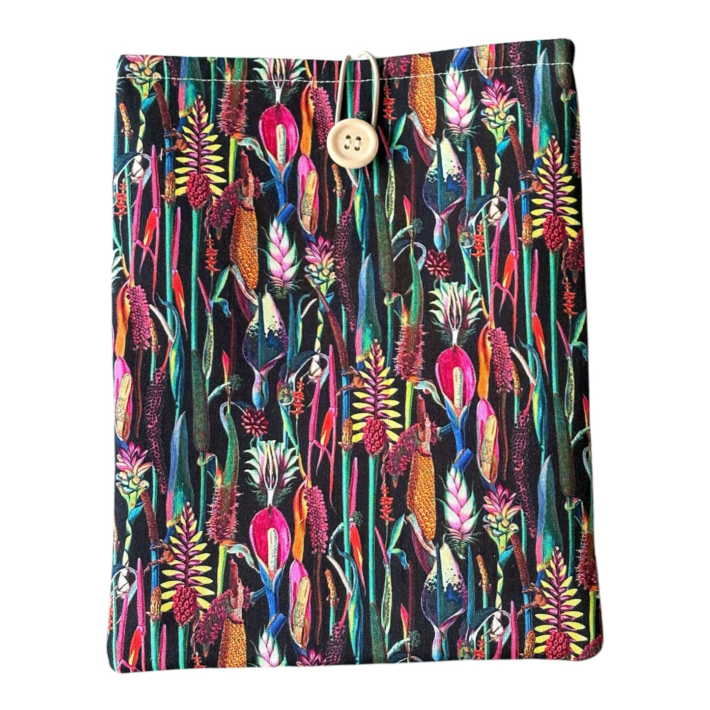 The Book Pouch fastens with elastic and button to keep a book or Kindle e-Reader safe.