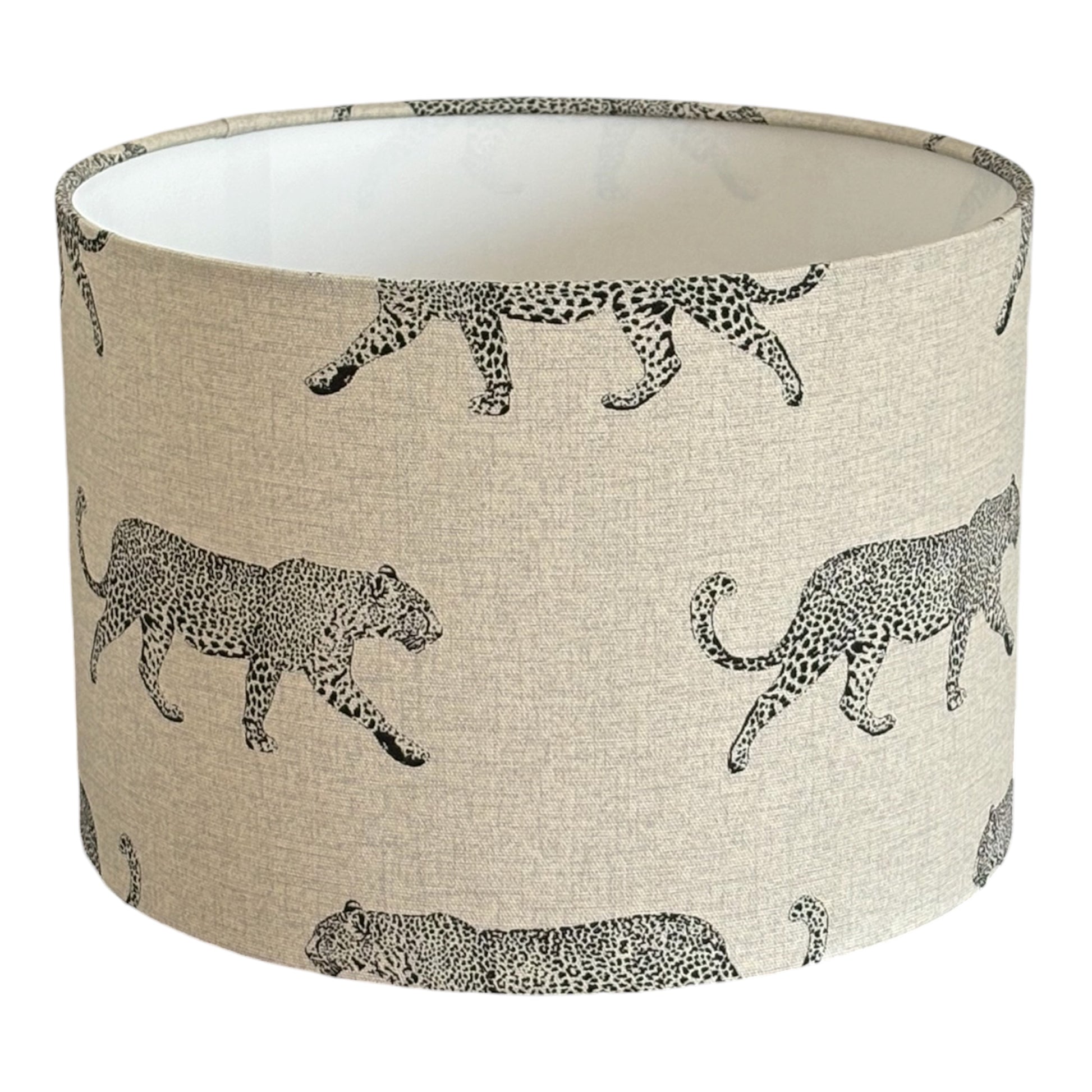Handmade 30cm drum lampshade made with striking leopard print fabric.